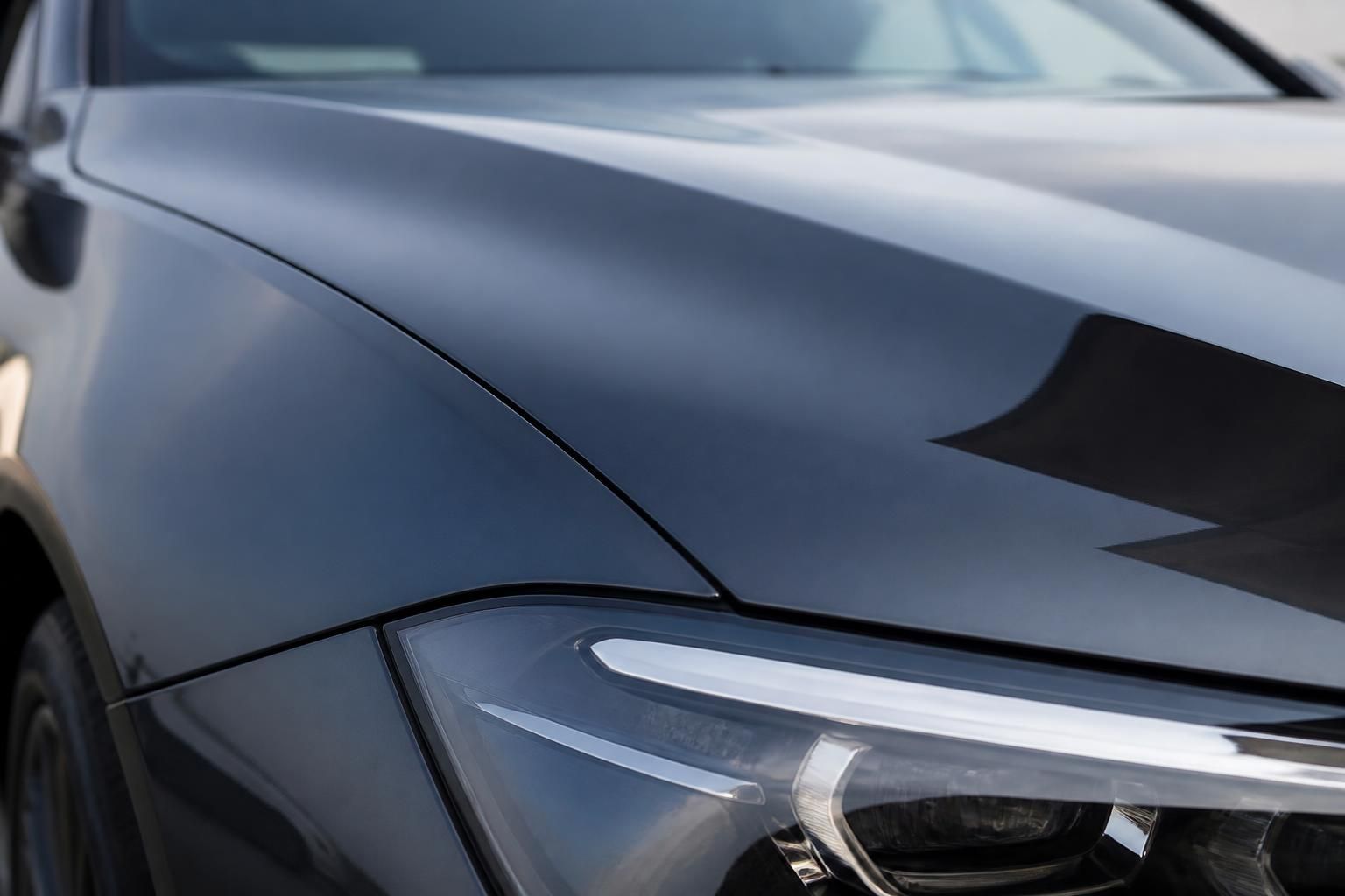 A smooth swirl-free car paint finish after correction